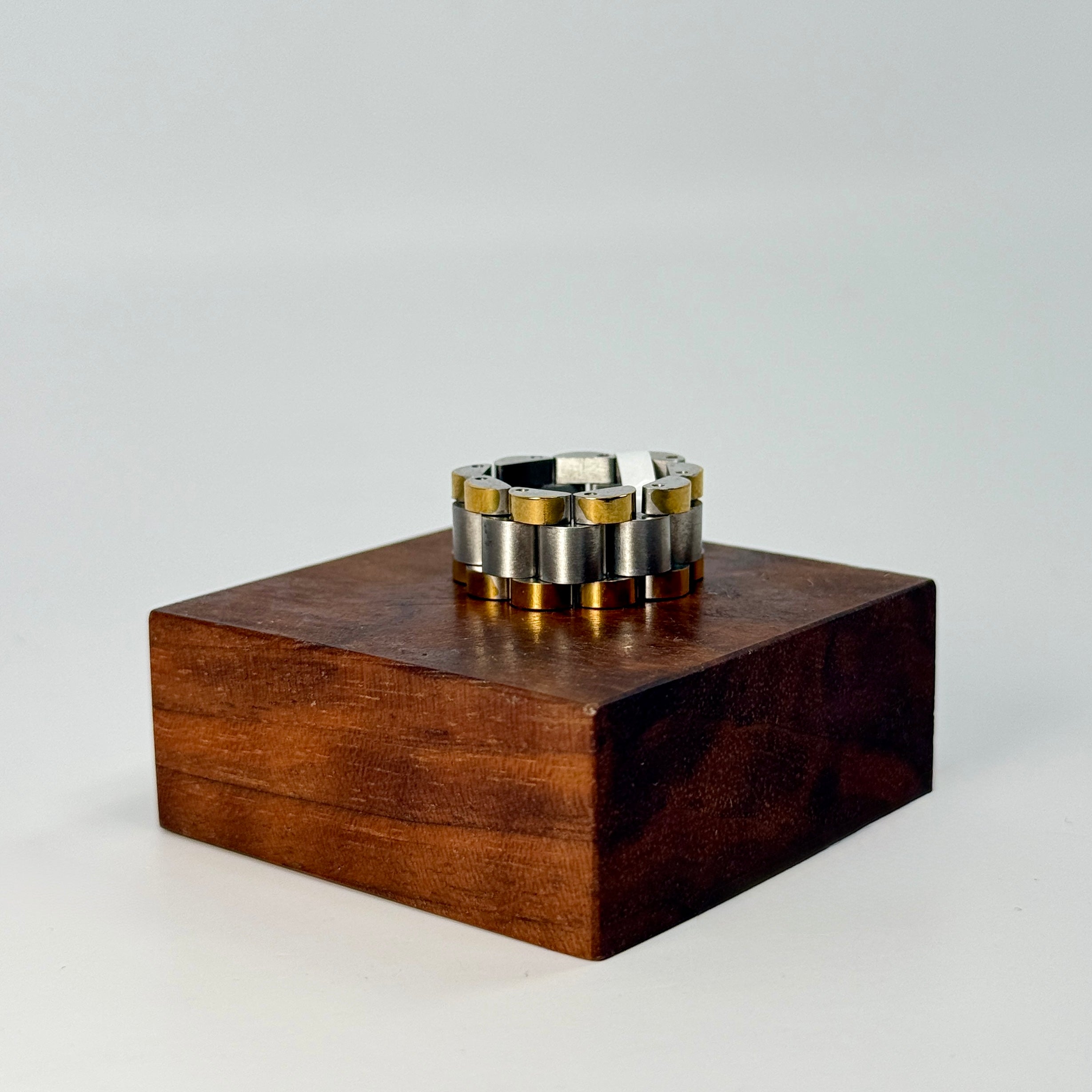 Wooden box with a silver and gold ring on a white background  | B. Marie Accessories, Shannon Johnson, DMV